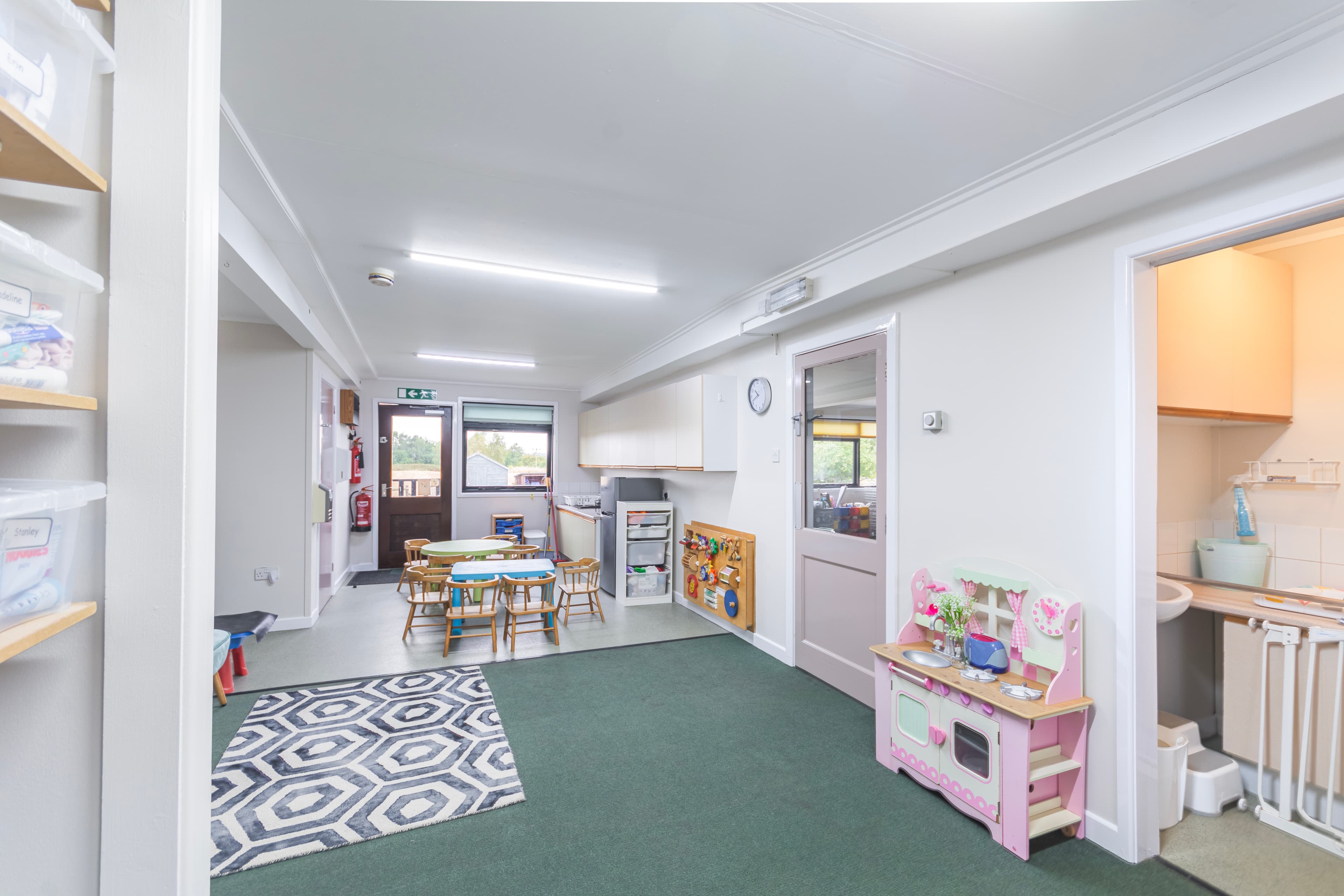 Baby Room with play kitchen and small tables