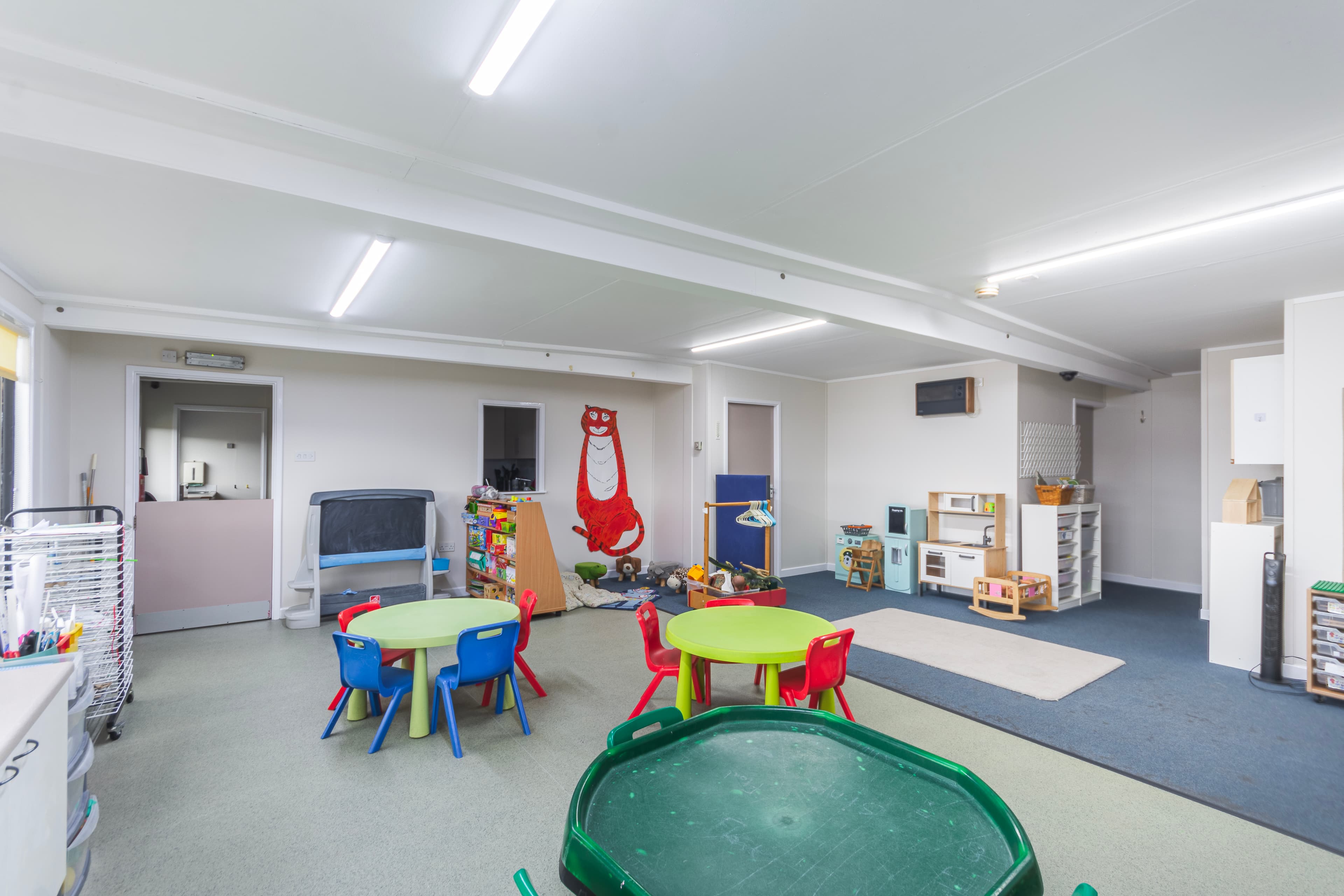 Toddler Room with tables, chairs and water tray